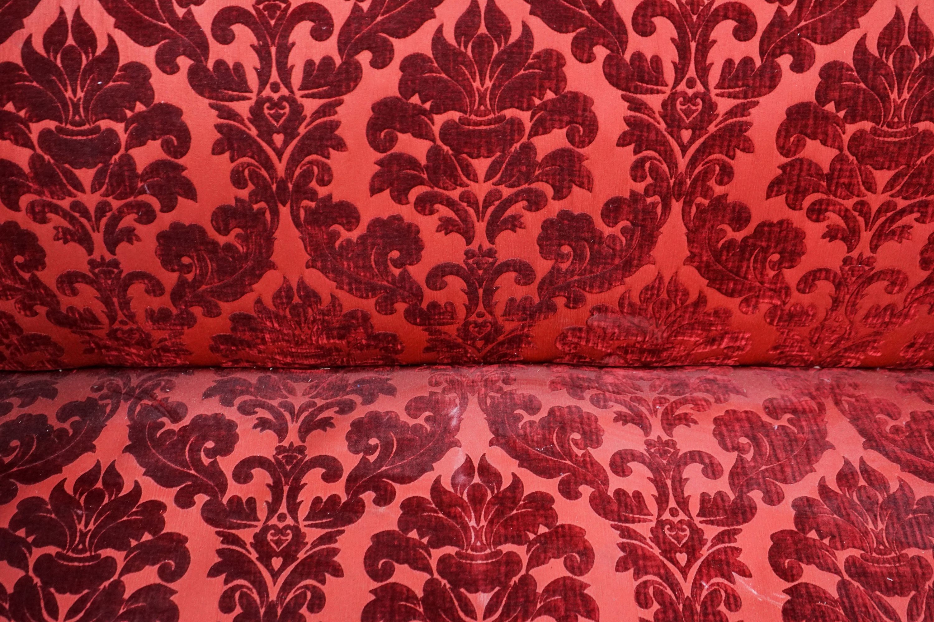 A George III upholstered settee, length 170cm, depth 70cm, height 83cm